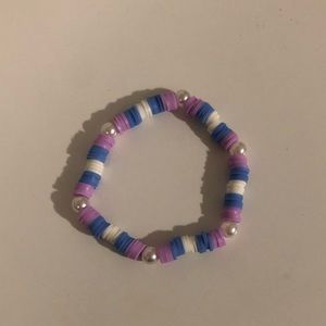 Purple, blue, and white clay beads bracelet